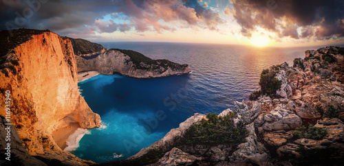 Sunset at Navagio Bay Zakynthos Greece. Panoramic view over the photo