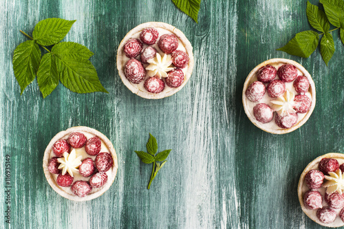 Sweet small tarts with fresh raspberry