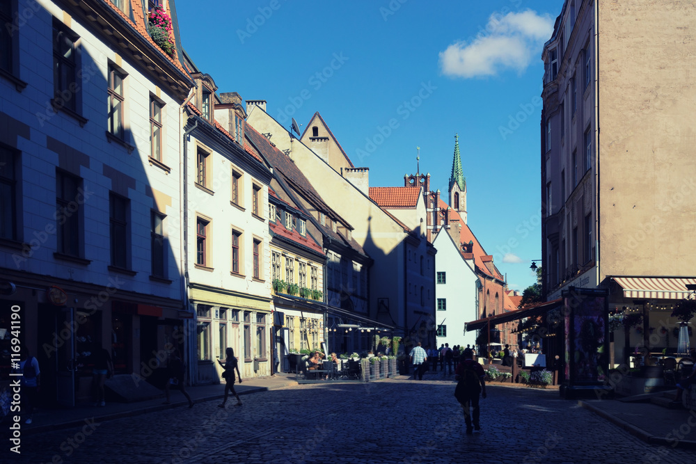 The shadows of the houses on the streets of the old city of Riga