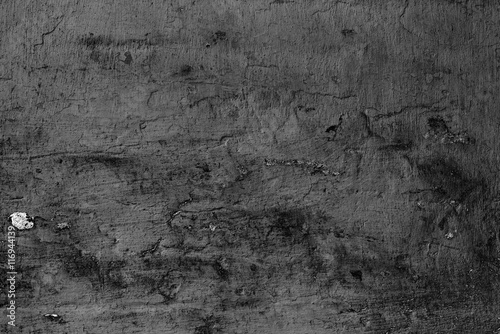 Wall fragment with scratches and cracks