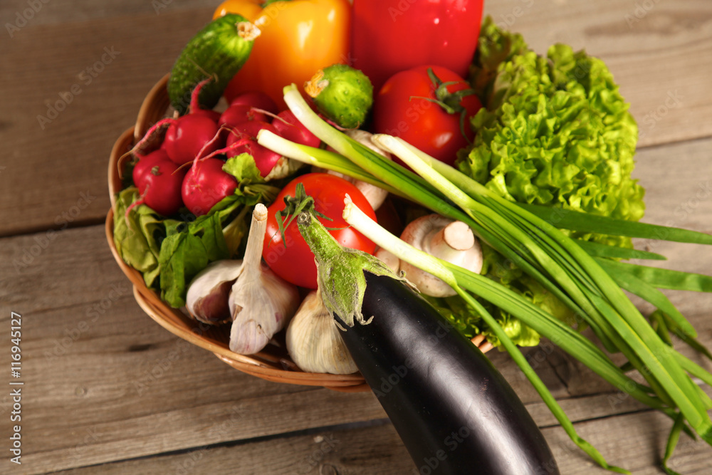 Fresh vegetables on a clean wooden table Fresh vegetables on a clean wooden table