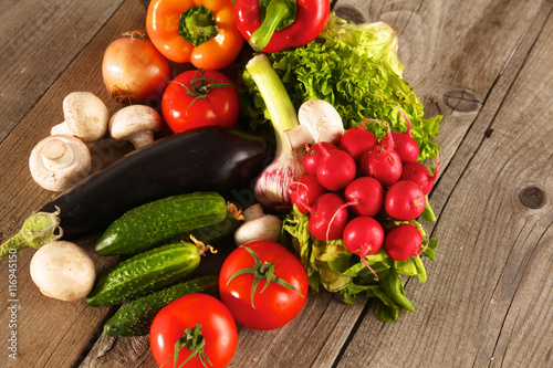 Fresh vegetables on a clean wooden table