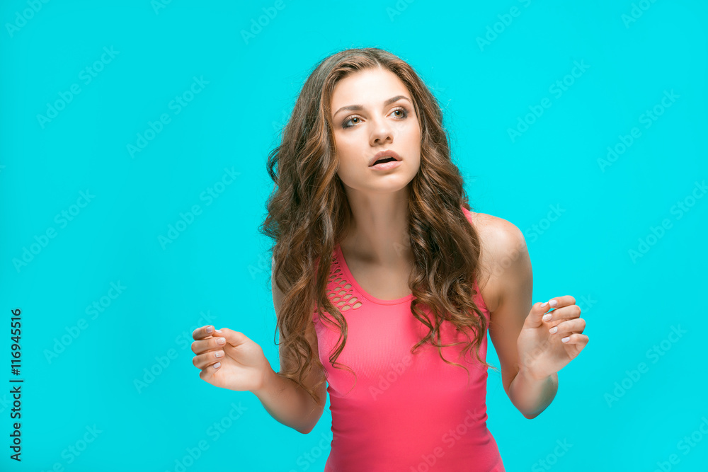 Fototapeta premium The young woman's portrait with thoughtful emotions