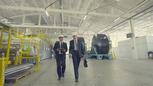 Wallpaper Mural Men discussing business on factory Torontodigital.ca