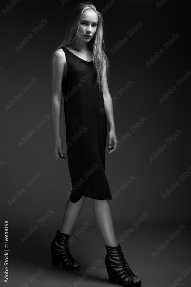 fashion model with long hair, beautiful eyes, perfect skin is posing in studio for glamour test photo shoot showing different poses fashion model with long hair, beautiful eyes, perfect skin is posing in studio for glamour test photo shoot showing different poses