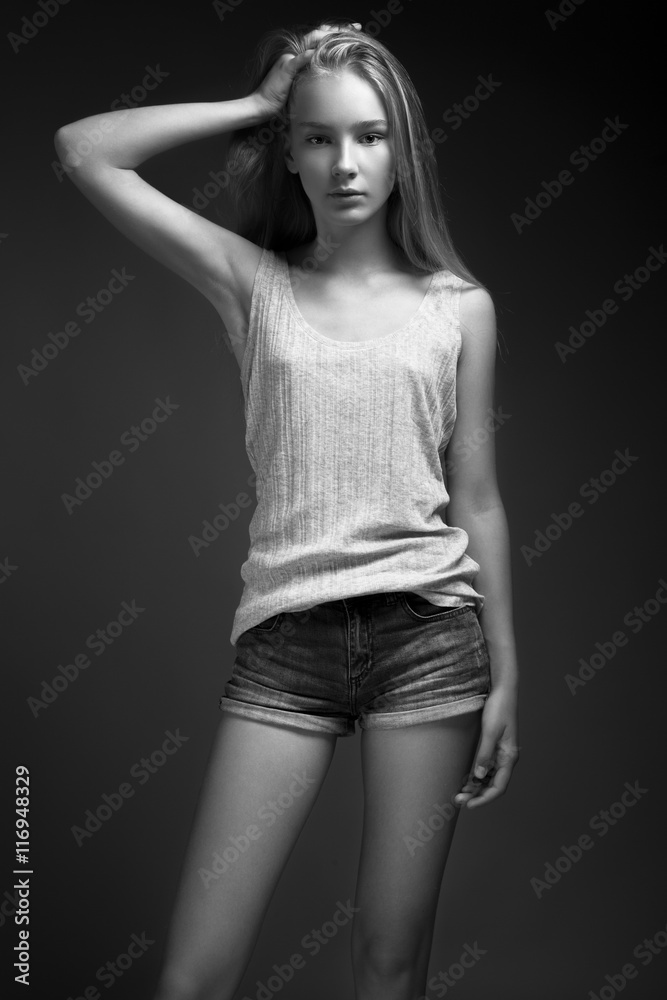 fashion model with long hair, beautiful eyes, perfect skin is posing in studio for glamour test photo shoot showing different poses fashion model with long hair, beautiful eyes, perfect skin is posing in studio for glamour test photo shoot showing different poses