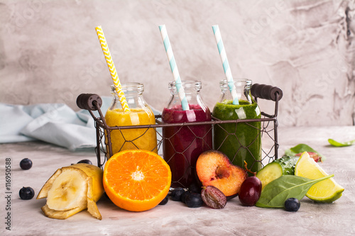 Fresh bright smoothies in a wire basket