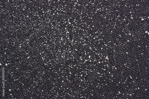 Pieces of dandruff on clothes
