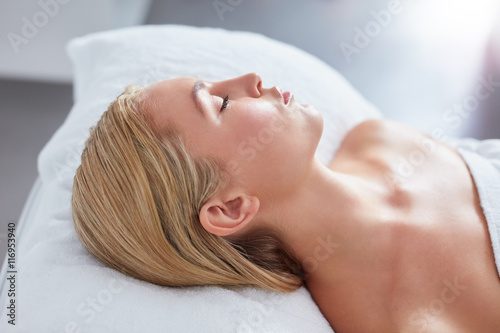 Young woman relaxing on massage table