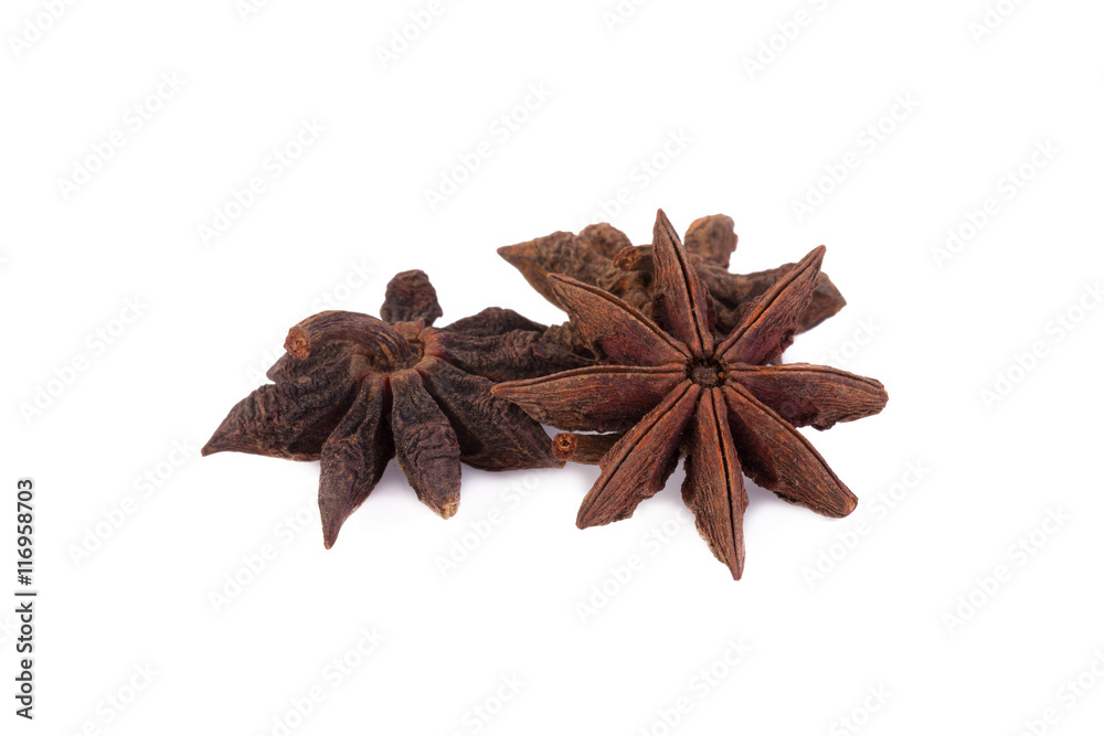 Star anise spice fruits isolated on white background