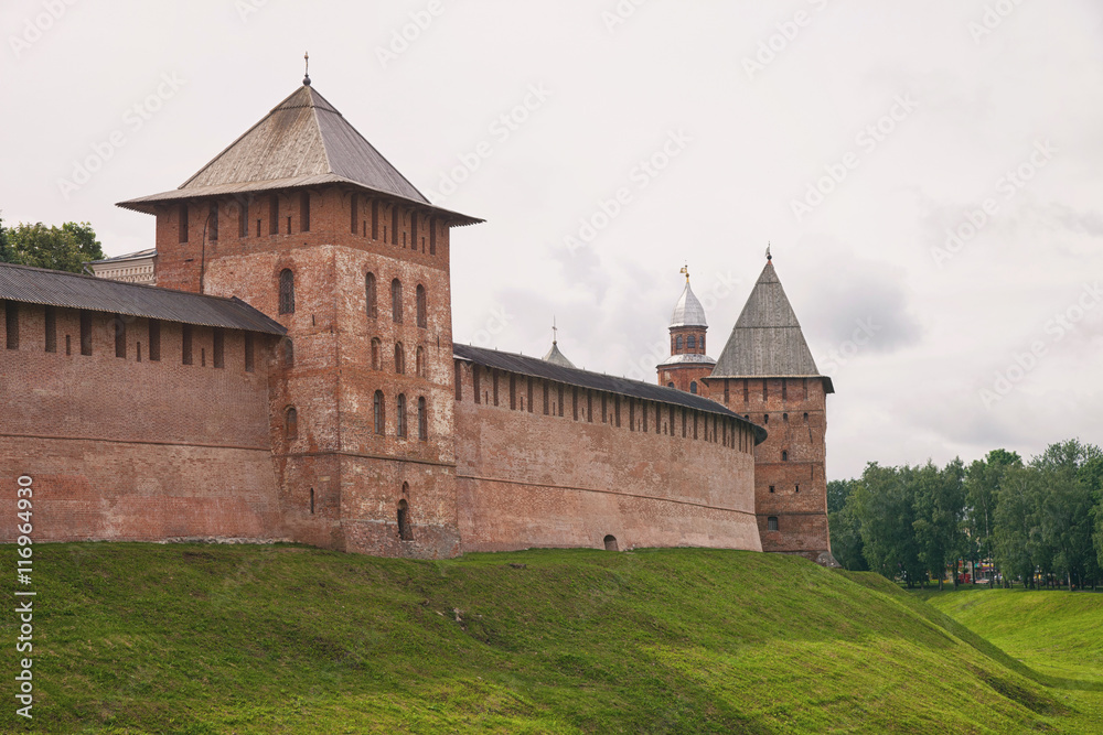 Veliky Novgorod. View of the Kremlin wall, ditch and towers.