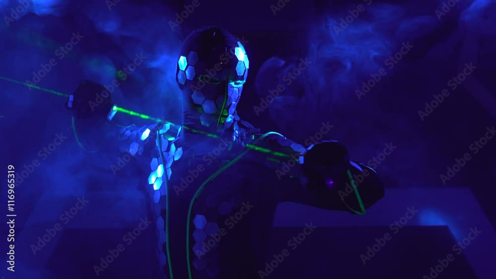 Man dancing with laser concept future Man dancing with laser concept future