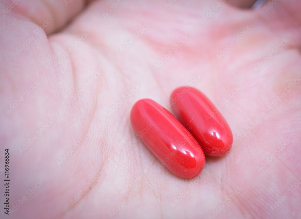 two red pills in hand two red pills in hand