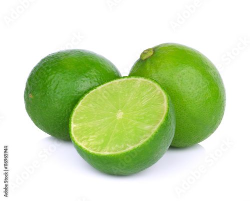 Limes with slices isolated on white background