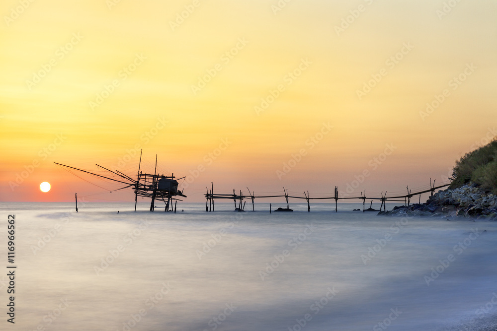 San Vito Chietino, Abruzzo, Italy: Trabucco Turchino. Ancient fishing machine in the sunrise light with silky sea