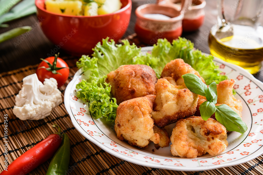 Breaded fried cauliflower with potatoes Breaded fried cauliflower with potatoes