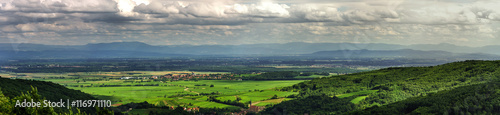 Classic natural landscape view with mountains on the background