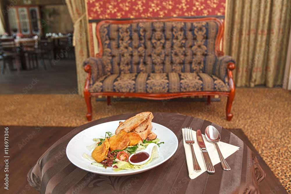 Fototapeta premium Potato pancakes with vegetable salad and homemade bread.