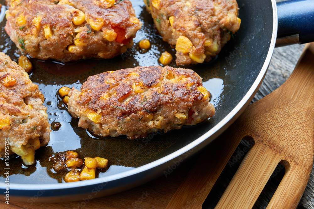 Homemade meat and vegetable cutlets on frying pan Homemade meat and vegetable cutlets on frying pan
