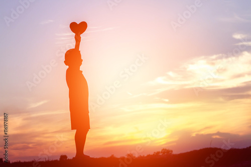boy hands holding hearts silhouette