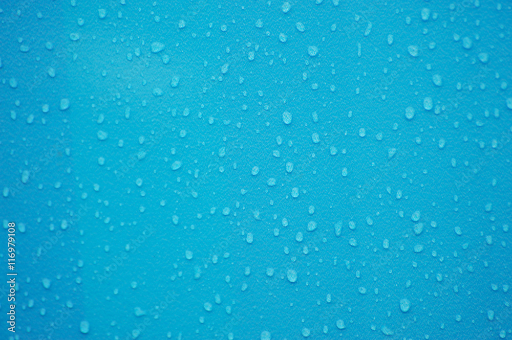 rain drop on blue plastic surface