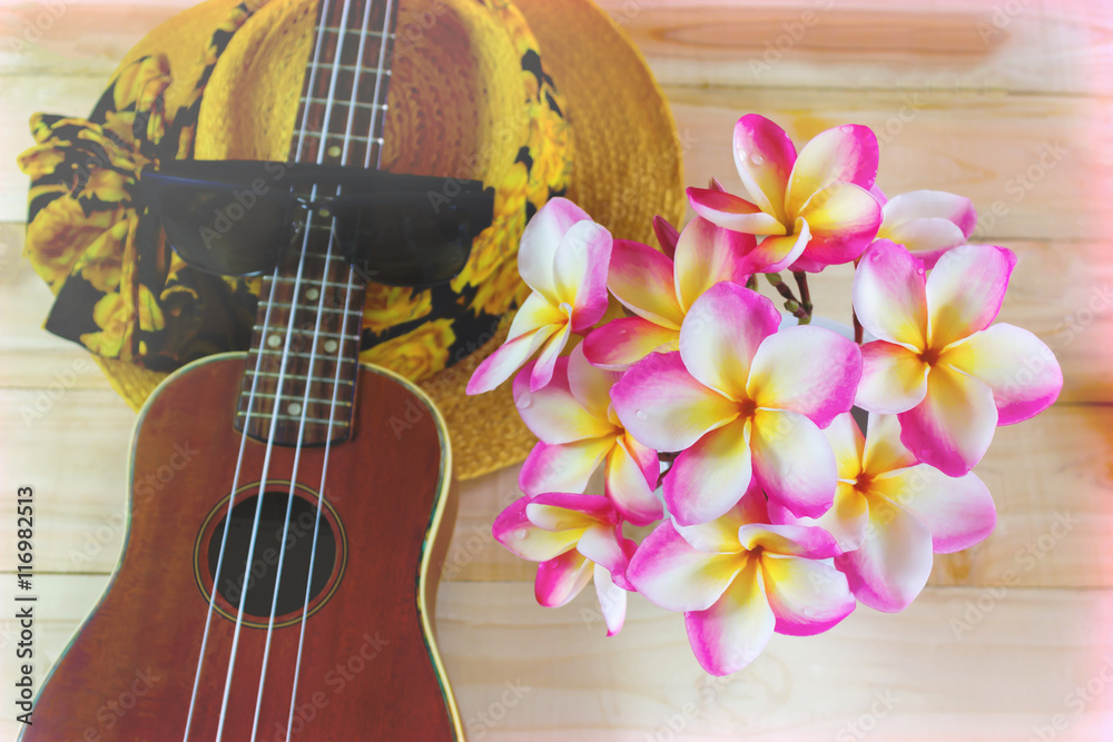 Flowers bunch plumeria or frangipani with ukulele and summer hat Stock  Photo | Adobe Stock
