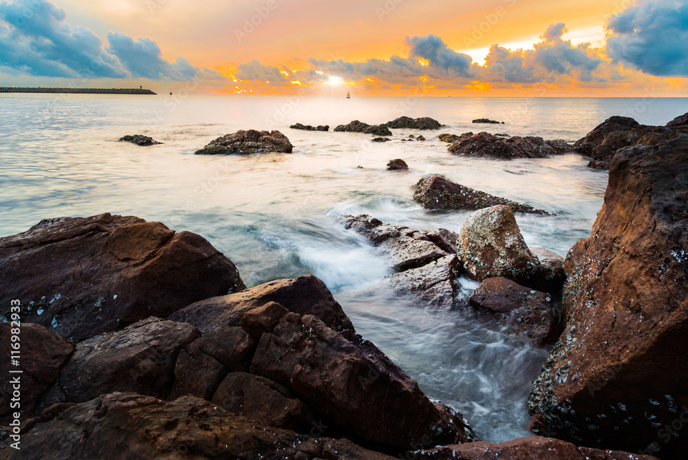 Seascape during sunrise time. Beautiful natural tropical beach o Seascape during sunrise time. Beautiful natural tropical beach o