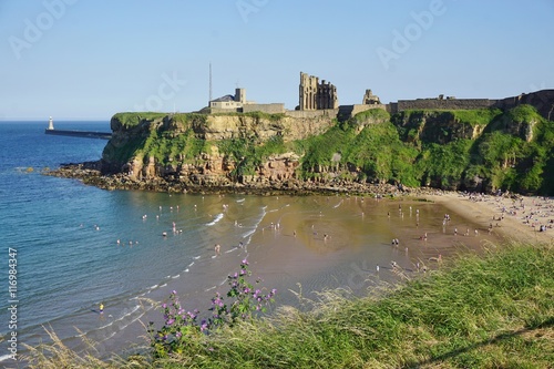 Beach and priory ruins in Tynemouth, England photo