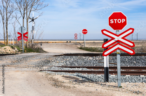 Fotografie Stop sign in a level crossing with no barrier in Toledo Province, Spain
