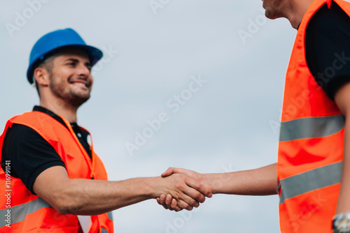 Handshake on construction site meeting © Microgen