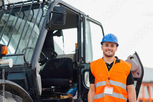 Skid steer loader operator at the construction site