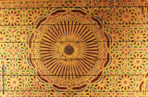 Golden eastern pattern on the ceiling of an old building in Marrakech  Morocco