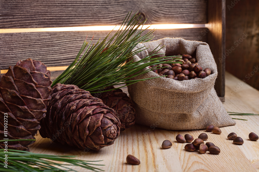 Pine cones and nuts in the bag. Pine cones and nuts in the bag.
