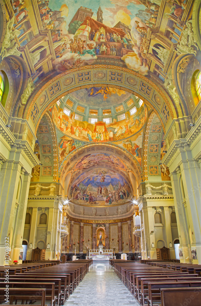 ROME, ITALY - MARCH 10, 2016: The nave of church Basilica di Santa Maria Ausiliatrice with the frescoes by the Salesian priest and artist Don Giuseppe Melle 20. cent.