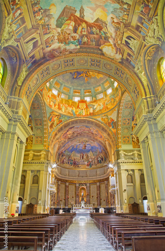 ROME  ITALY - MARCH 10  2016  The nave of church Basilica di Santa Maria Ausiliatrice with the frescoes by the Salesian priest and artist Don Giuseppe Melle 20. cent.