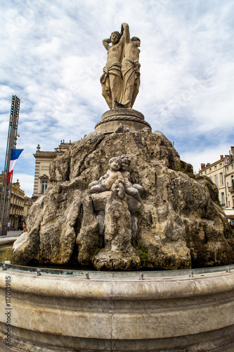 The three graces fountain at Place de la Comedie photo