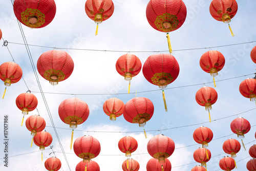 Red Chinese lanterns against blue sky at Yap Kongsi Temple in Georgetown, Penang, Malaysia