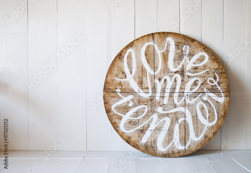 Love words.Love me tender. Letters written on wooden background 