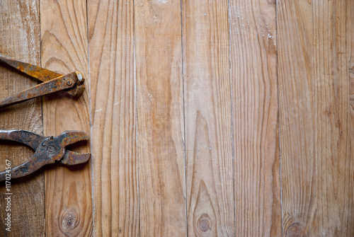 old tools on wooden background 