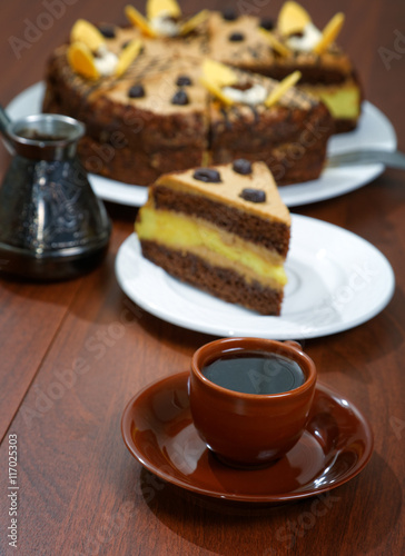 cake with a cup of coffee on the table