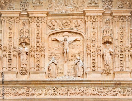 SALAMANCA, SPAIN, APRIL - 17, 2016: The Crucifixion as the detail from portal of Convento de San Esteban by Juan Ribero de Rada (1590 - 1592) inspirated by Italian renaissance.