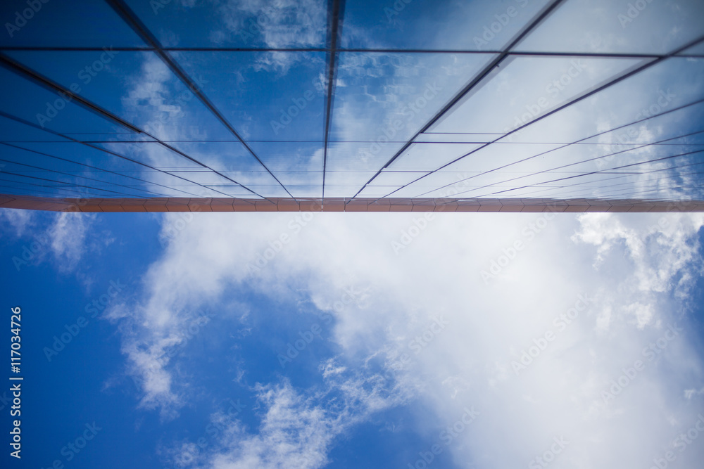facade of glass office building, the view from bottom up facade of glass office building, the view from bottom up