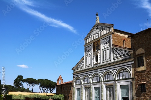 Fototapeta Naklejka Na Ścianę i Meble -  Basilica San Miniato al Monte under blue sky in Florence, Italy