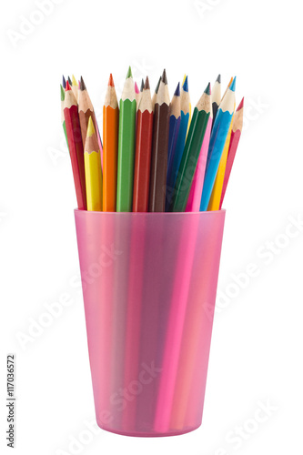 Many colored pencils in pink mug