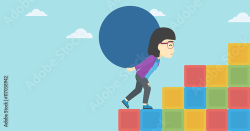 Bild auf Leinwand Woman carrying concrete ball uphill.
