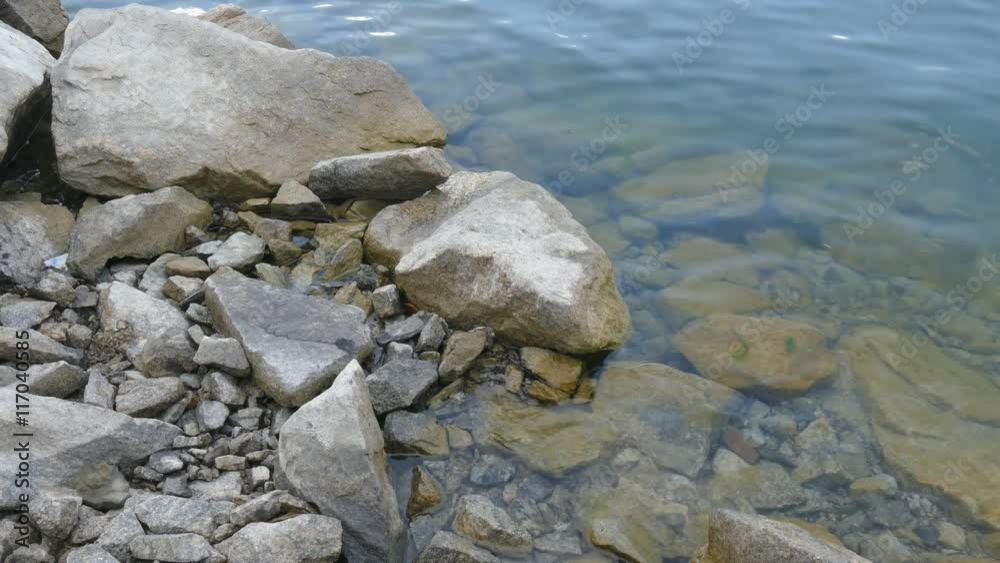Rocky shore of the lake Rocky shore of the lake