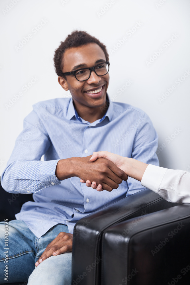 African American businessman shaking hands