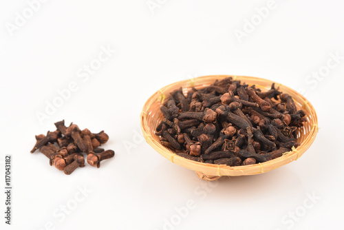 Dry Clove, medicinal herbs on a white background.