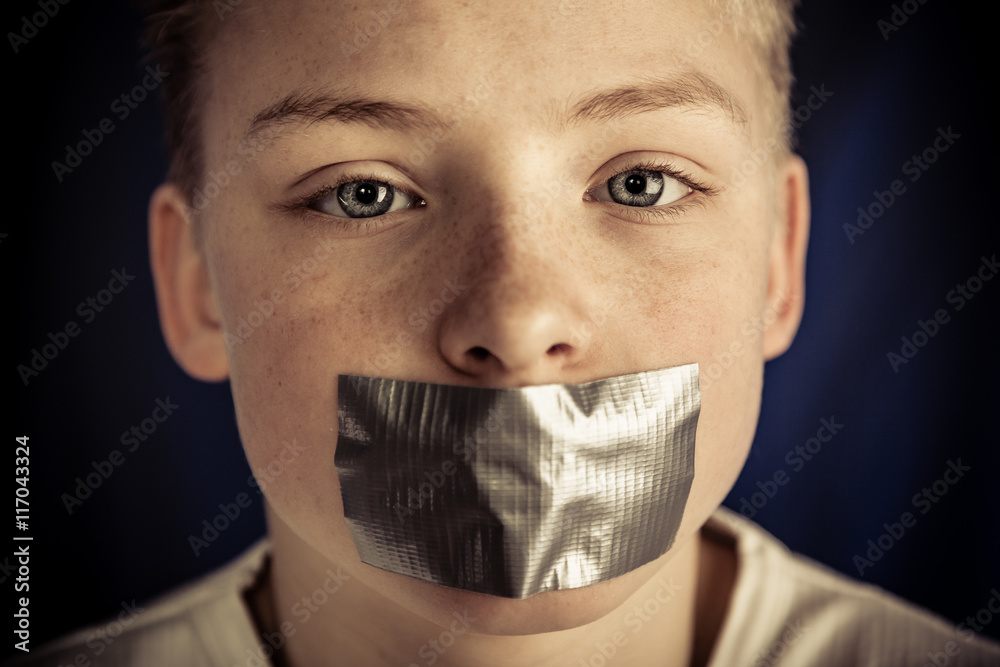 Young Teenage Boy with Duct Tape Covering Mouth Stock Photo | Adobe Stock