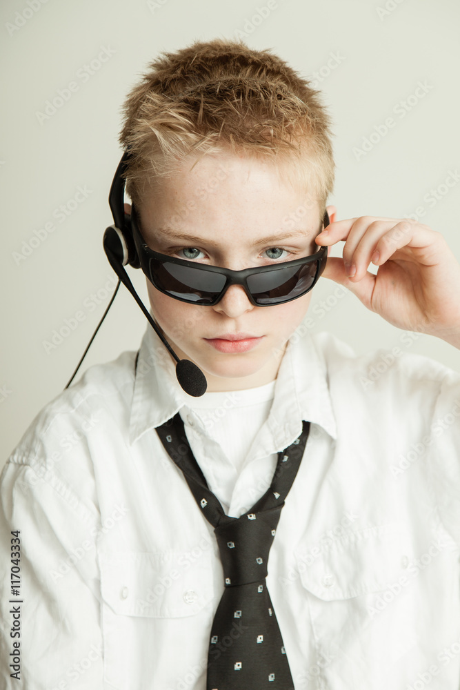 Boy Dressed as Slick Businessman with Head Set Boy Dressed as Slick Businessman with Head Set